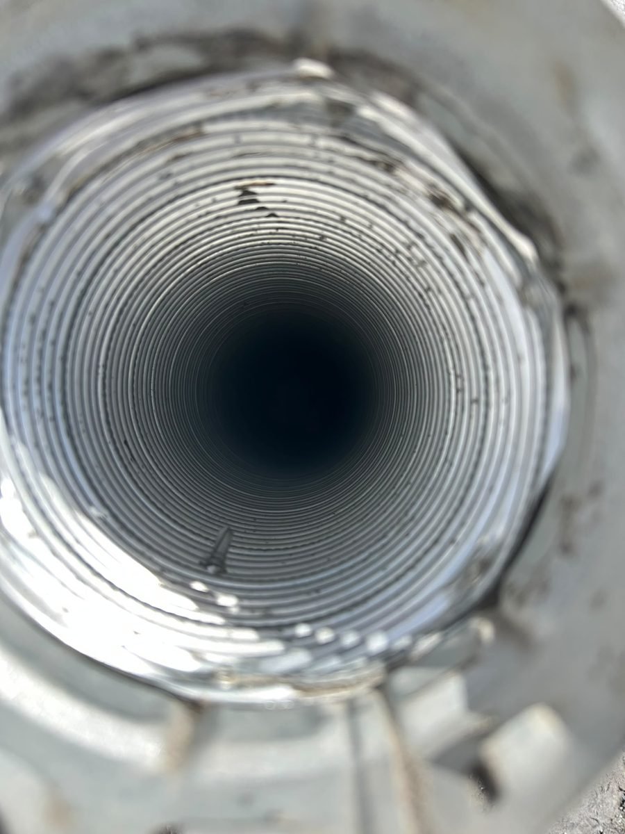 Clean metal dryer vent duct after lint removal